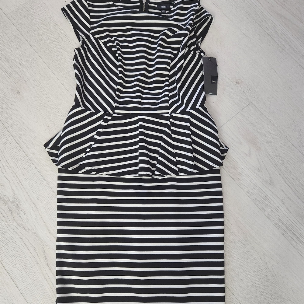 Black and White Form Fitting Dress. With Accent Ruffle and Cap Sleeves. New